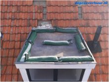 lekkage door weggewaaide zinken daken en daktrimmen