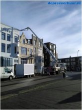 RVS pijp in schoorsteen trekken