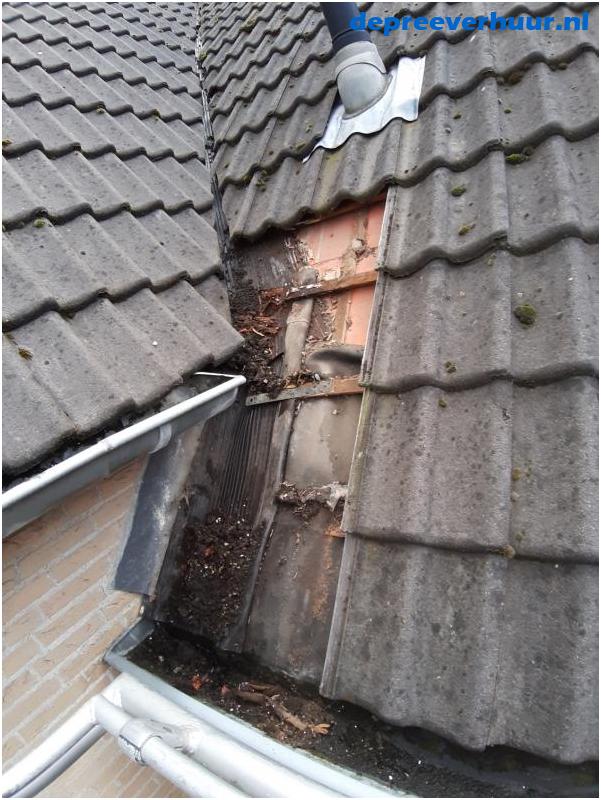 Lekkage door verstopte kilgoot