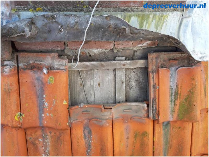 Lekkage door verschoven dakpan