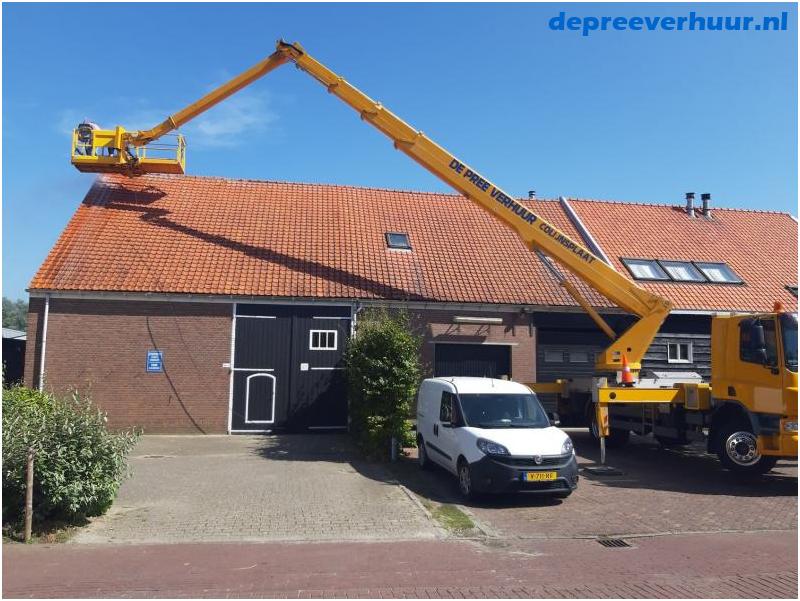 Schoonspuiten dakpannen