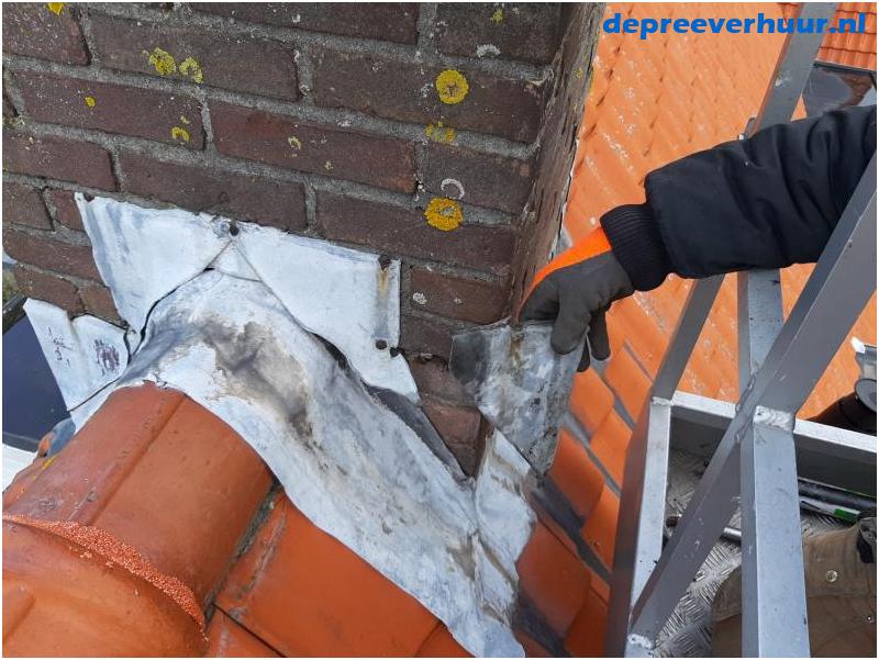 Lekkage door weggewaaide loodslab