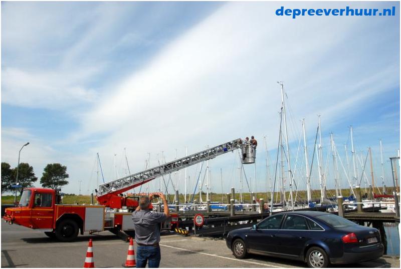 Reparatie in mast met ladderwagen