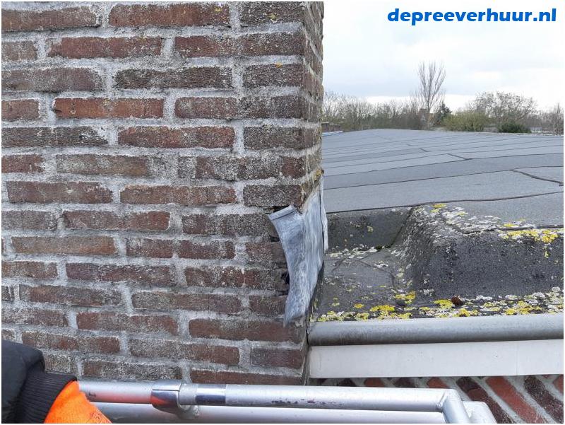 Lekkage door weggewaaide loodslab