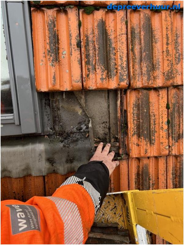 Lekkage door verstopte afvoer dakraam