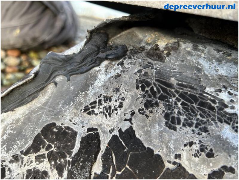 Lekkage door verouderde bitumen dak