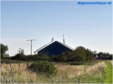 Zonnepanelen reinigen met hoogwerker