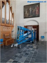 Hoogwerker in kerk Middelburg