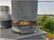 Lekkage door doorgeroeste kachelpijp