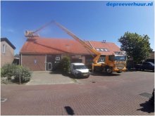 Schoonspuiten dakpannen