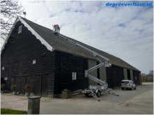 Hoogwerker huren voor boerenschuur